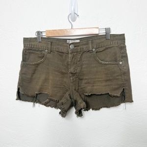 Free People | Army Green Mid Rise Short Shorts Denim Raw Hem Size 29